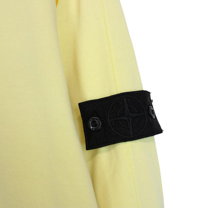 Stone Island yellow v-neck sweatshirt with logo patch and soft cotton material.