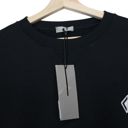 Dior navy blue sweatshirt featuring embroidered CD icon logo on cotton material.