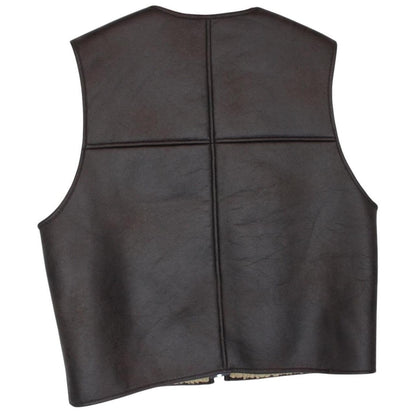 Supreme brown reversible faux shearling work vest with logo patch and textured fabric.