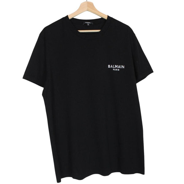 Balmain black pocket t-shirt with white embroidered logo and short sleeves.
