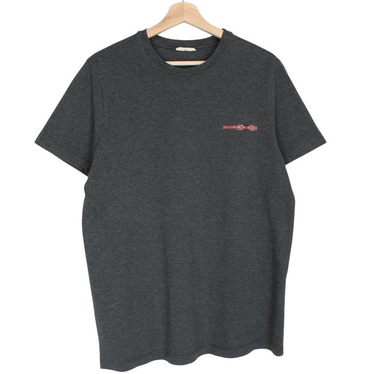 Prada grey cotton t-shirt with red logo and pocket detail, vintage style.