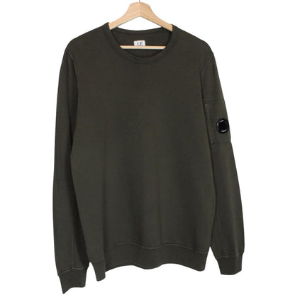 CP Company khaki green sweatshirt with goggle lens detail and cotton material.