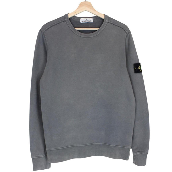 Stone Island grey cotton sweatshirt with embroidered compass logo and slight discolouration.