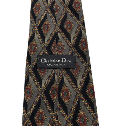 Christian Dior cream silk tie with multicoloured paisley print design.