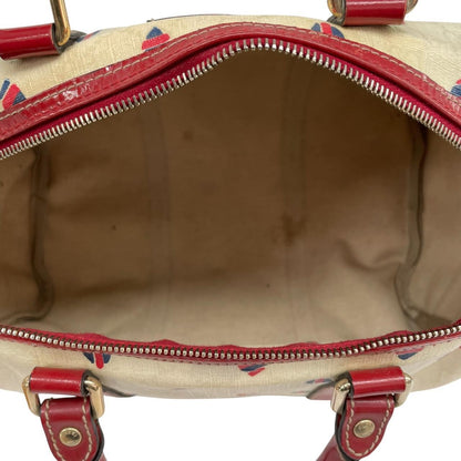 Gucci cream duffel bag with red monogram heart print and logo detailing.