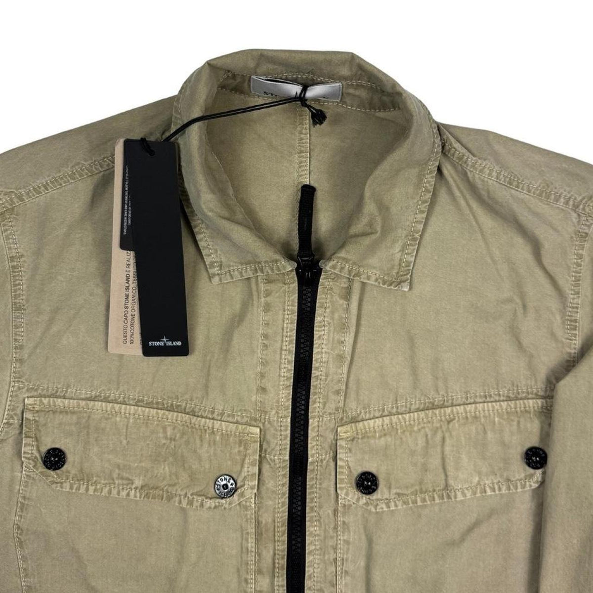 Stone Island khaki brown full zip cotton overshirt with logo patch and tag attached.