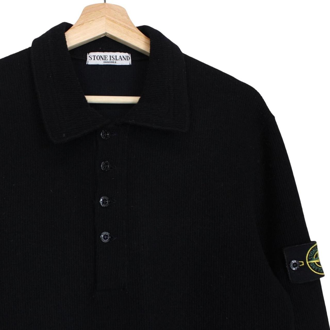 Stone Island black wool knit jumper with iconic compass logo and vintage design.