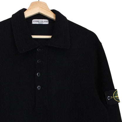 Stone Island black wool knit jumper with iconic compass logo and vintage design.