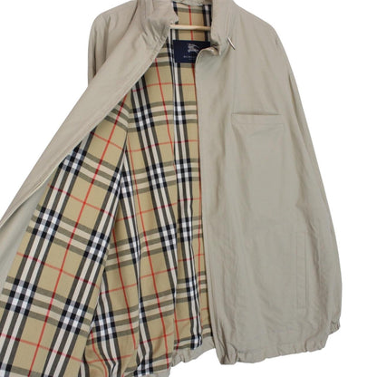 Burberry beige nylon jacket with Nova Check lining and full zip design.