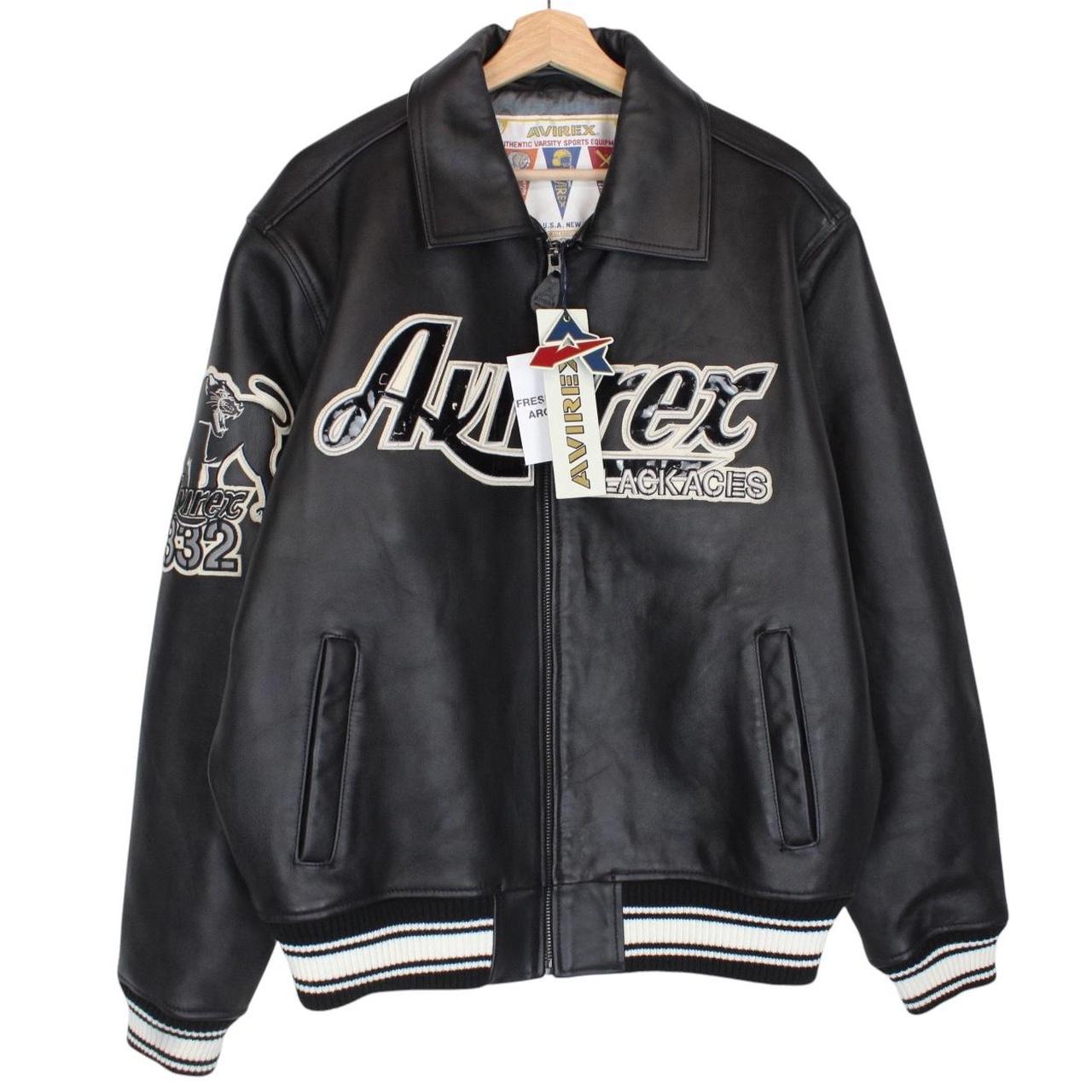 Avirex black leather jacket with Tuskegee Aces logo and full zip design.