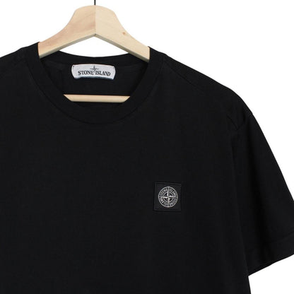 Stone Island black short sleeve t-shirt with compass logo and pocket detail.
