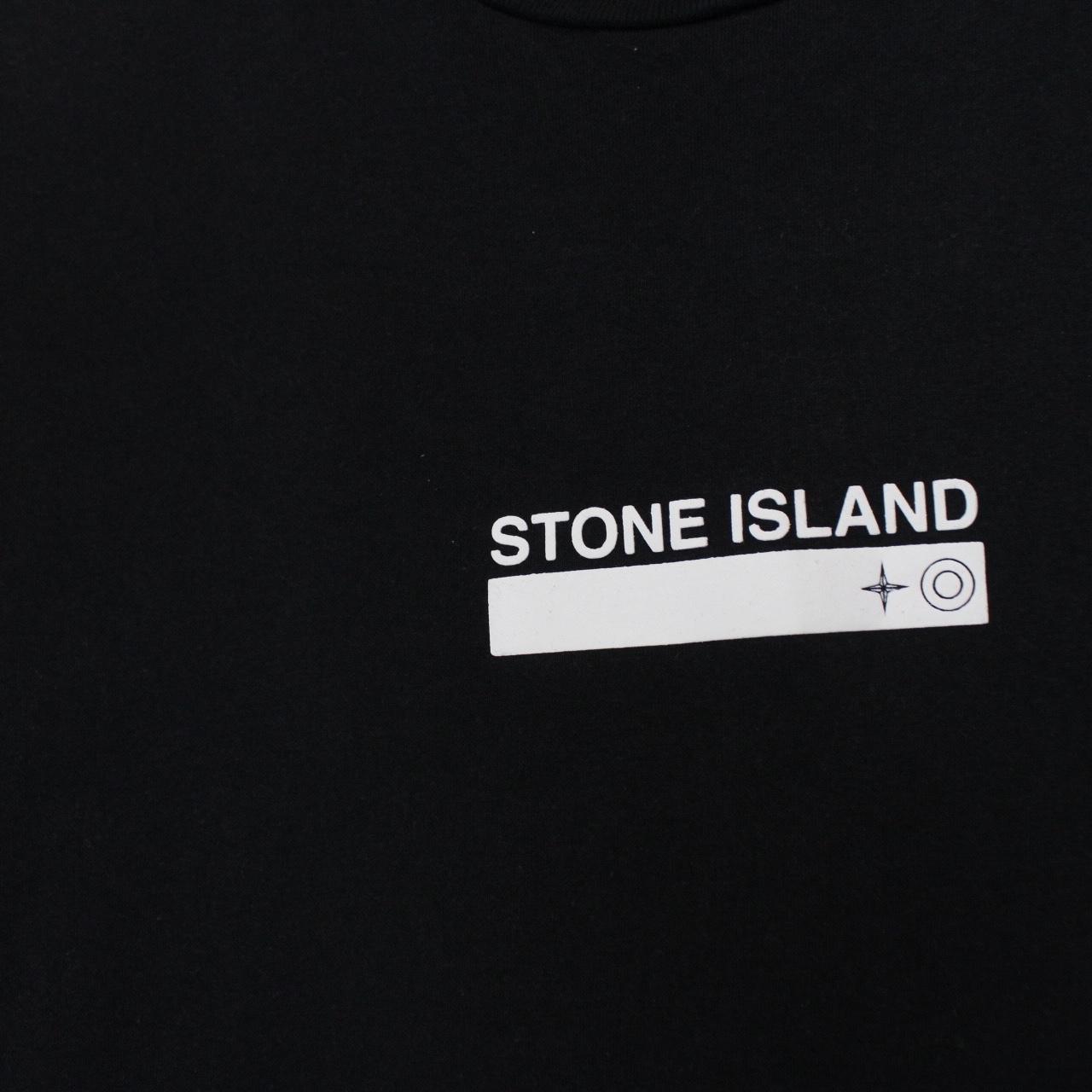 Stone Island black short sleeve cotton t-shirt with logo print and pocket detail.