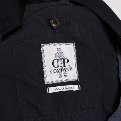 CP Company navy blue nylon jacket with multi pockets and garment dyed finish.