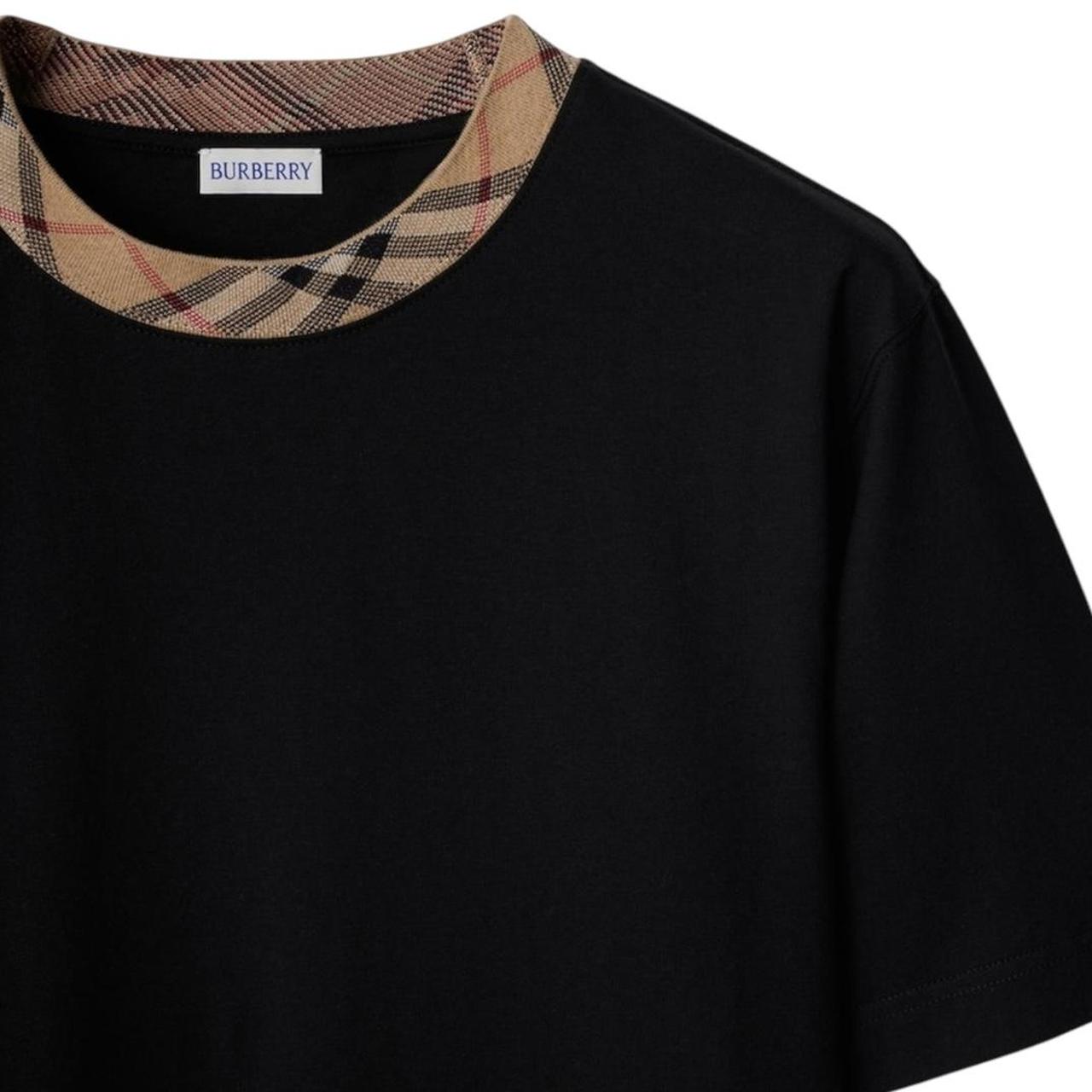 Burberry black pocket t-shirt with Nova Check collar and logo detail.