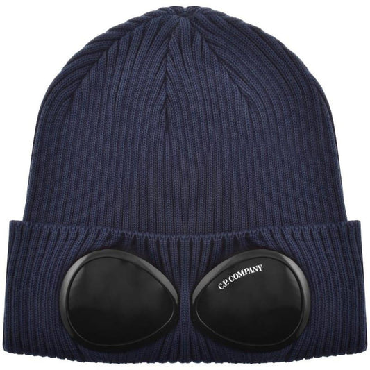CP Company navy blue beanie hat with goggle detail and cotton material.