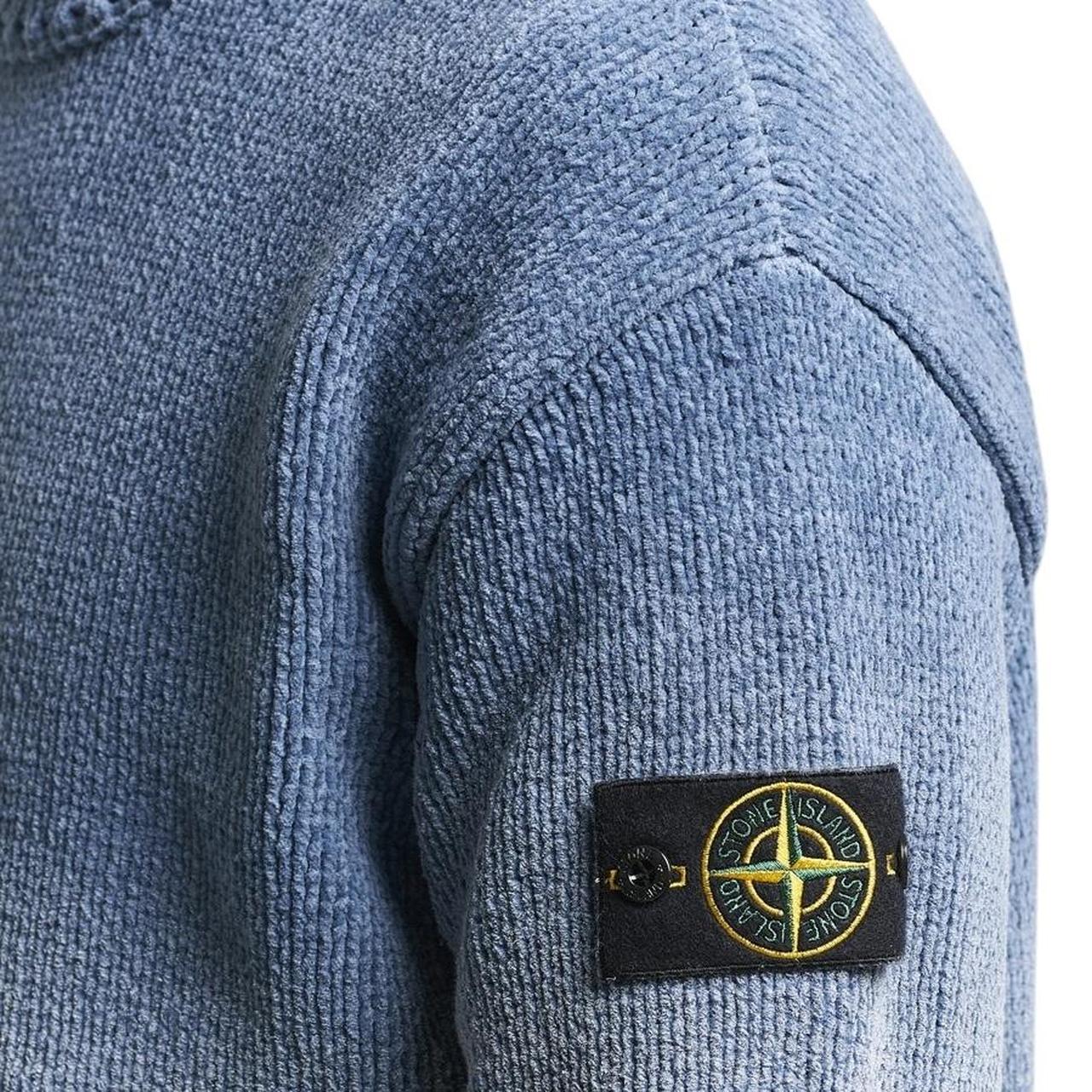Stone Island blue jumper with degrade knit pattern and logo badge on sleeve.