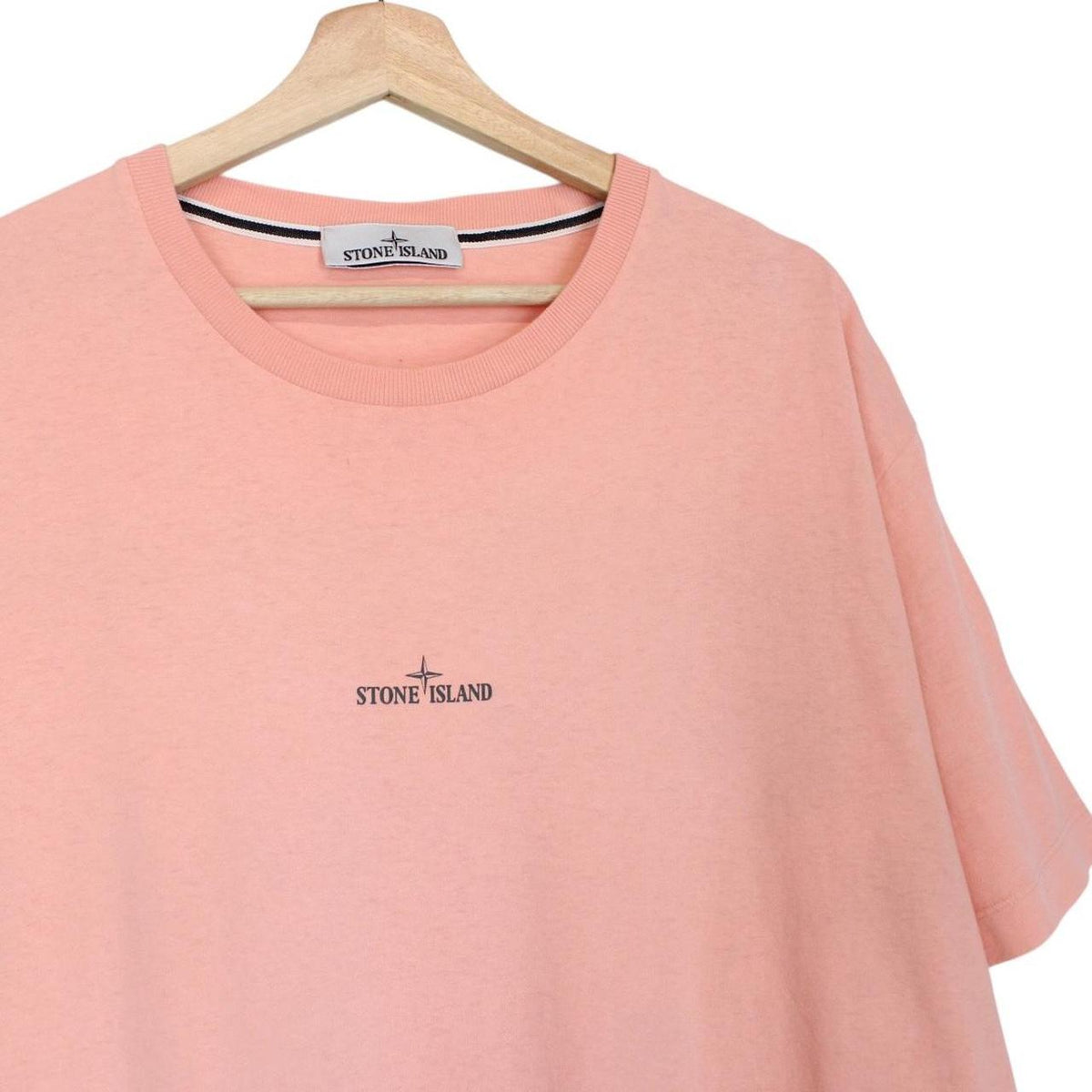 Stone Island pink short sleeve t-shirt with logo print and cotton material.