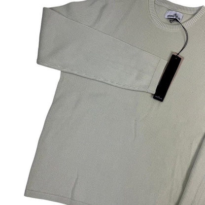 Stone Island beige waffle knit jumper with logo patch and organic cotton material.