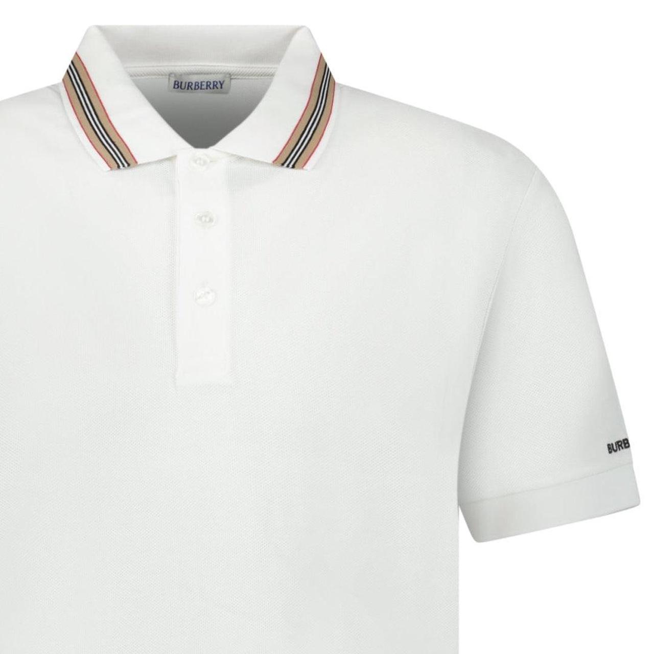 Burberry white polo shirt with striped check collar and cotton material.