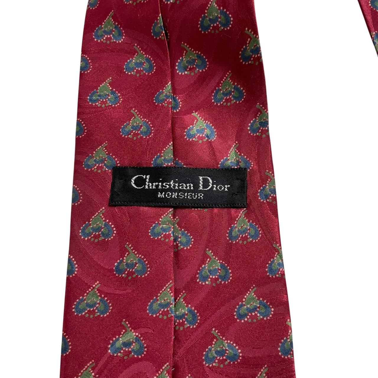 Christian Dior burgundy tie smooth polyester fabric with vintage design.