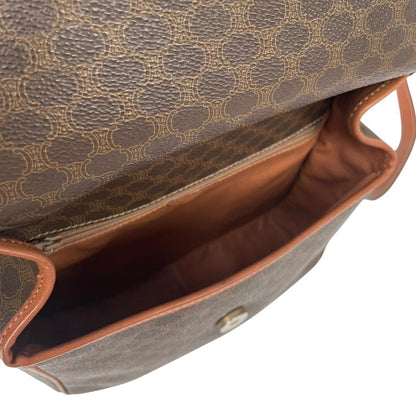 CELINE brown duffel bag with Macadam canvas pattern and logo detail.