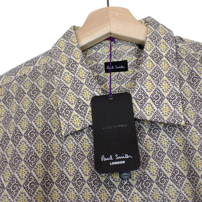 Paul Smith cream formal shirt with multicoloured abstract pattern and long sleeves.