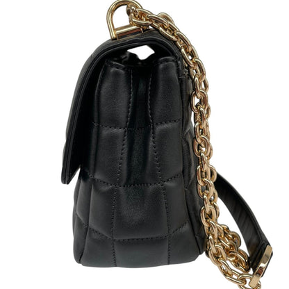 Michael Kors black duffel bag with quilted pattern and logo detail, pre-loved condition.