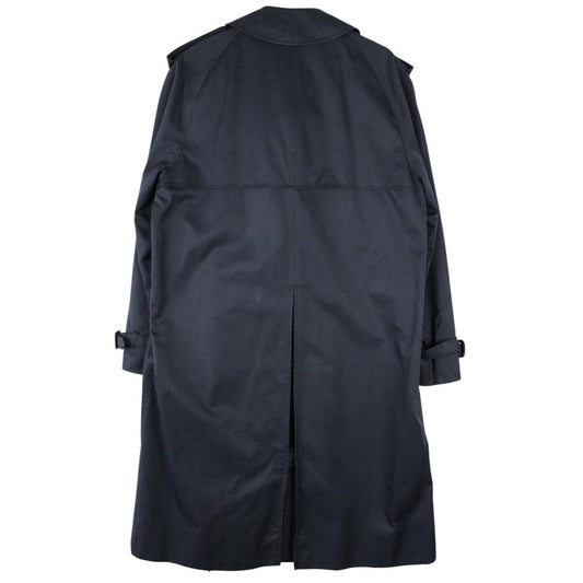 Aquascutum navy blue double breasted trench coat with house check pattern and logo.