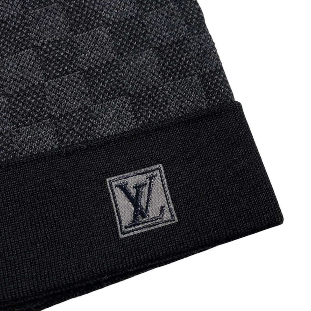 Louis Vuitton black and grey damier wool beanie with logo pattern.