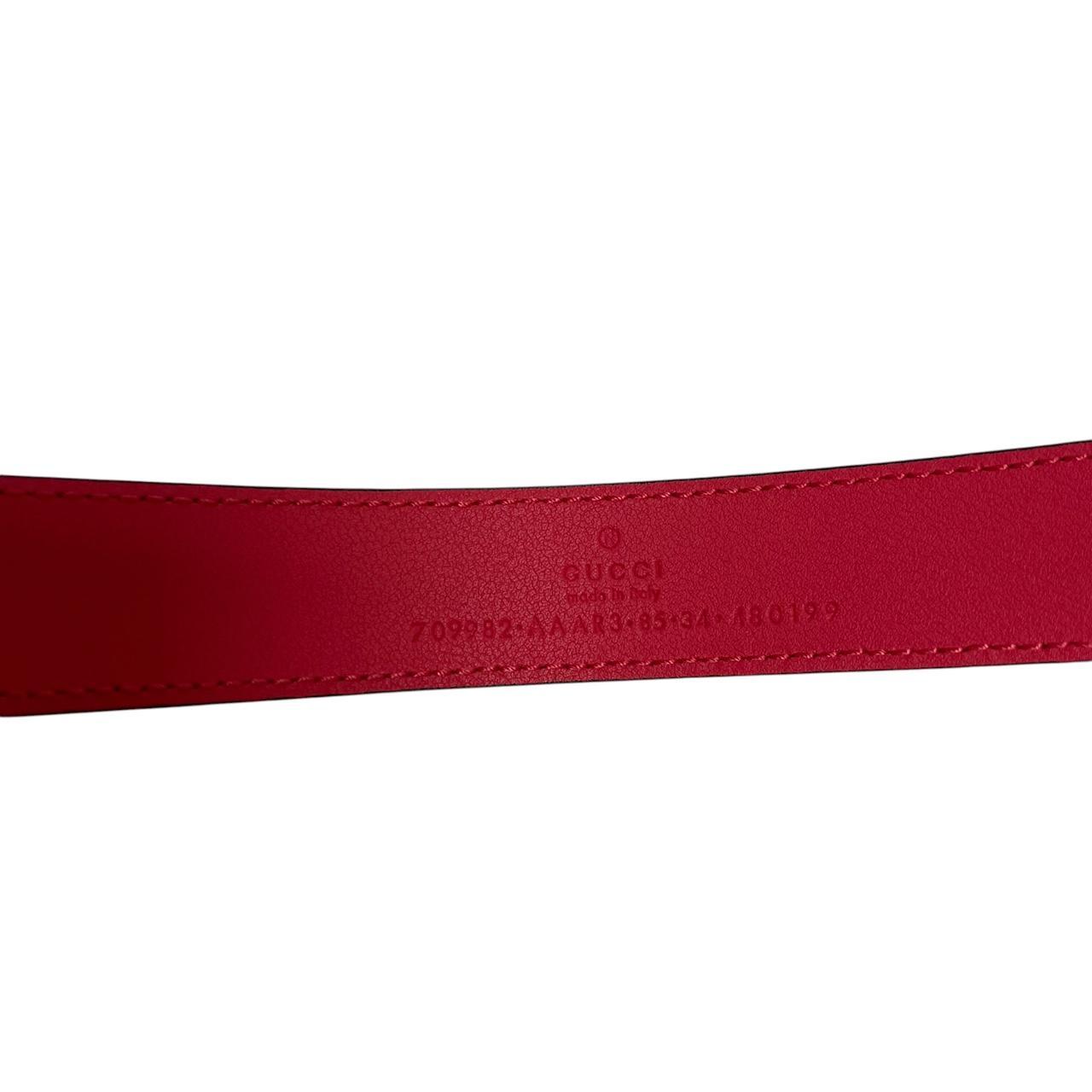 Gucci black and pink leather belt with Marmont buckle and gentle signs of use.