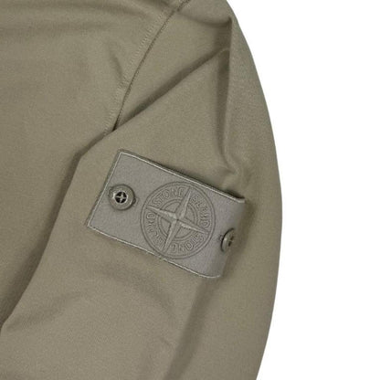 Stone Island beige full zip sweatshirt with ghost logo and cotton material.