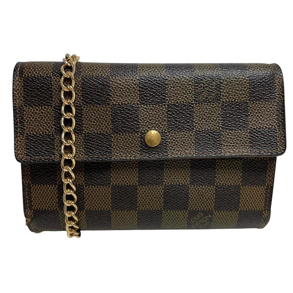 Louis Vuitton gold crossbody wallet Damier Ebene canvas with removable strap and logo.