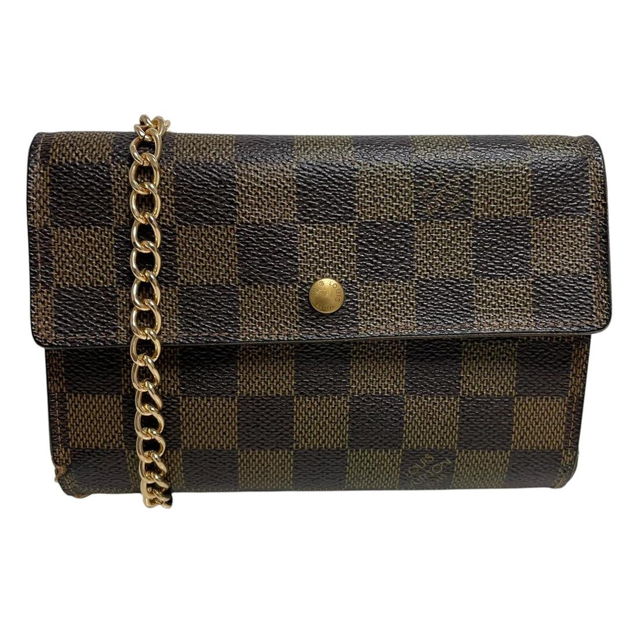 Louis Vuitton gold crossbody wallet Damier Ebene canvas with removable strap and logo.