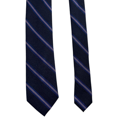 DKNY navy blue striped tie in silk/polyester blend with elegant sheen.