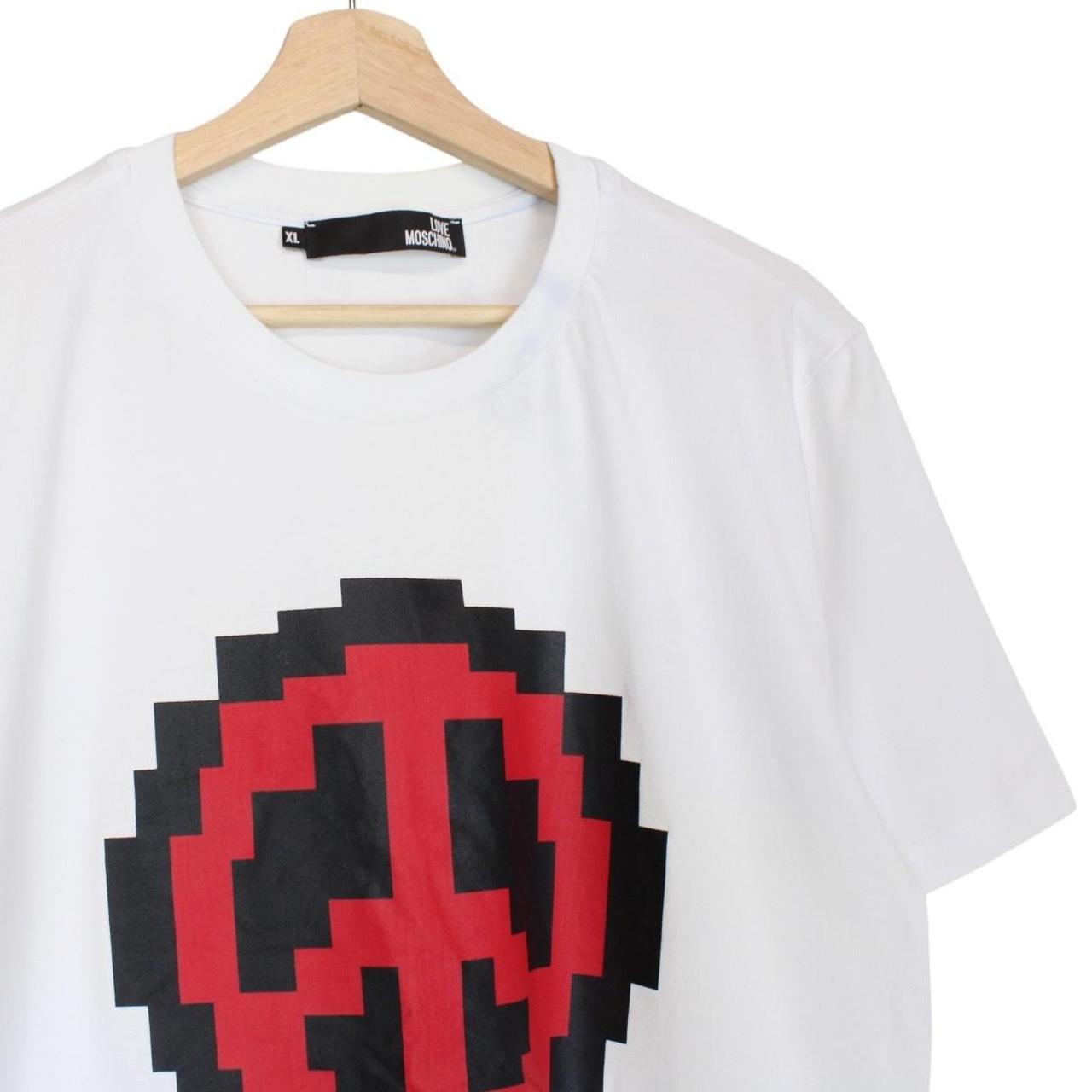Moschino white pocket t-shirt with digital peace print and faint back stain.