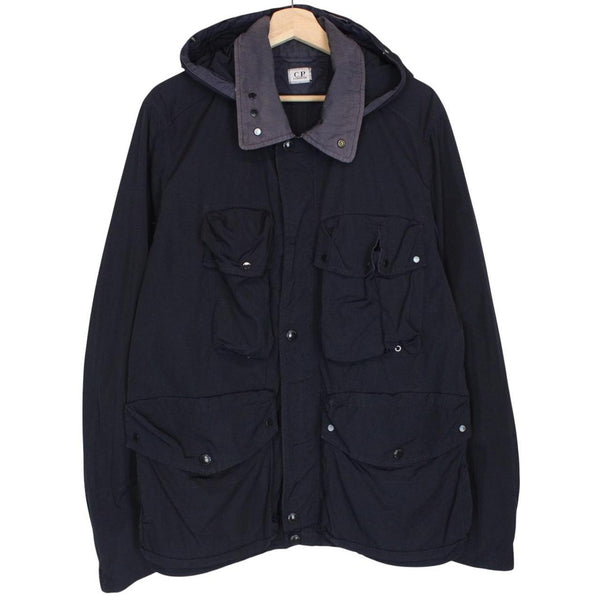 CP Company navy blue nylon jacket with multi pockets and garment dyed finish.