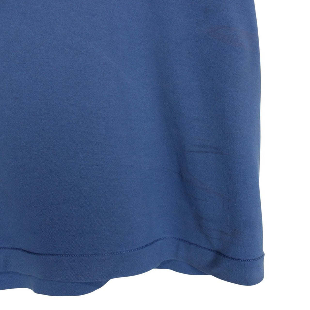 Stone Island blue short sleeve cotton t-shirt with compass logo and visible wear marks.