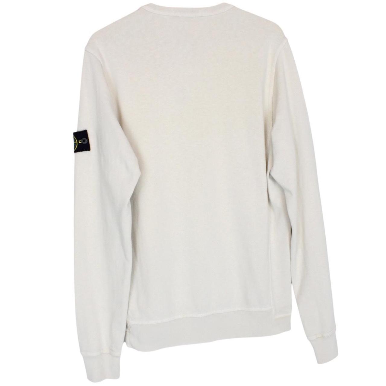 Stone Island beige cotton sweatshirt with logo patch and ribbed cuffs.