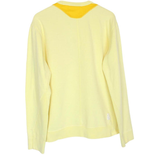 Stone Island yellow v-neck sweatshirt with logo patch and soft cotton material.