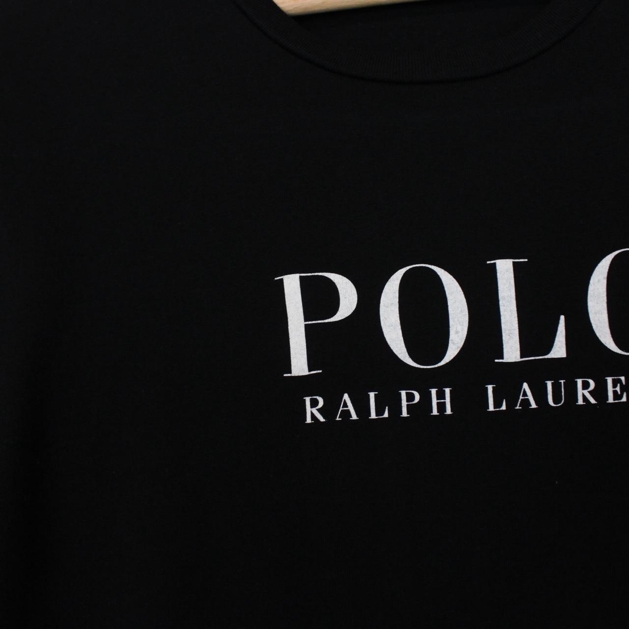 Polo Ralph Lauren black and white pocket t-shirt with logo print and cotton material.