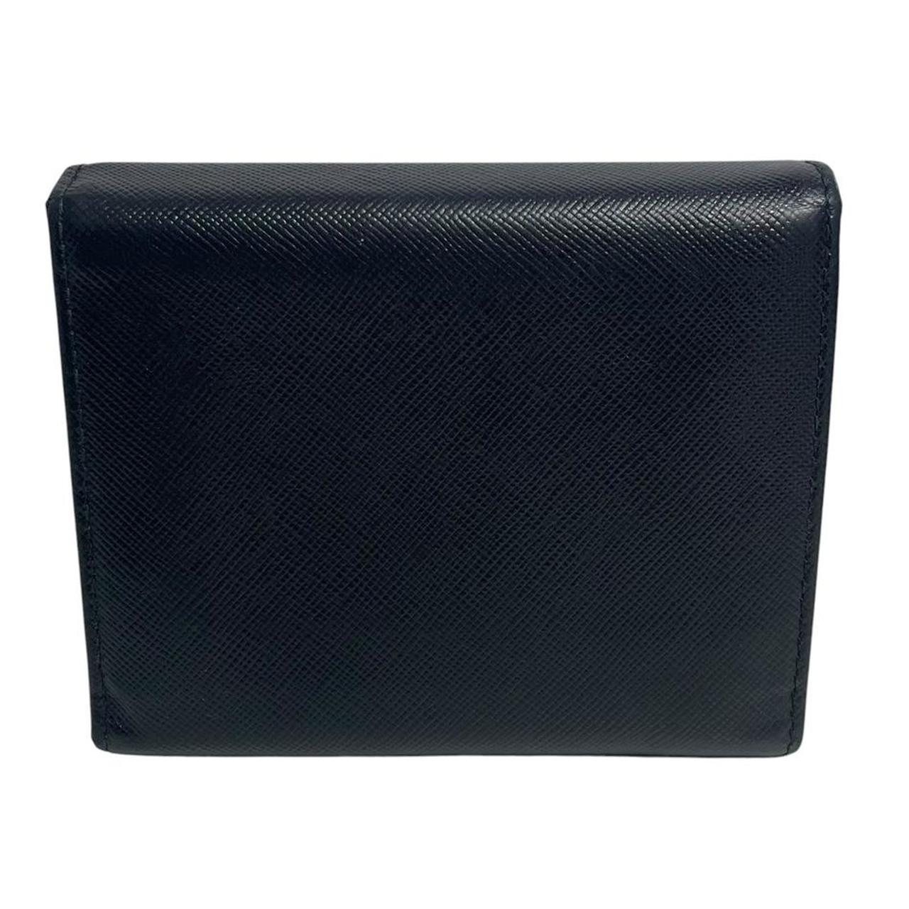 Prada black bifold wallet Saffiano leather with logo embossed detail.