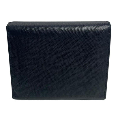 Prada black bifold wallet Saffiano leather with logo embossed detail.