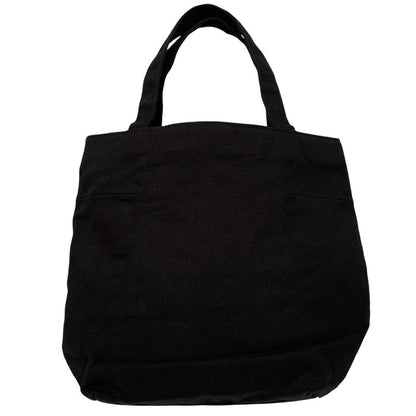 Yves Saint Laurent black duffel bag with gold embroidery and logo detail.