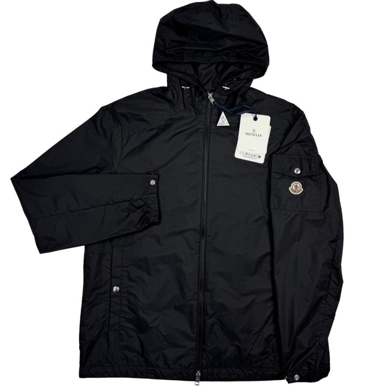 Moncler black windbreaker jacket, full zip, hooded, nylon material, logo on chest.