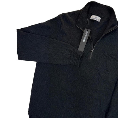 Stone Island black knit jumper with logo patch and cotton-linen blend material.