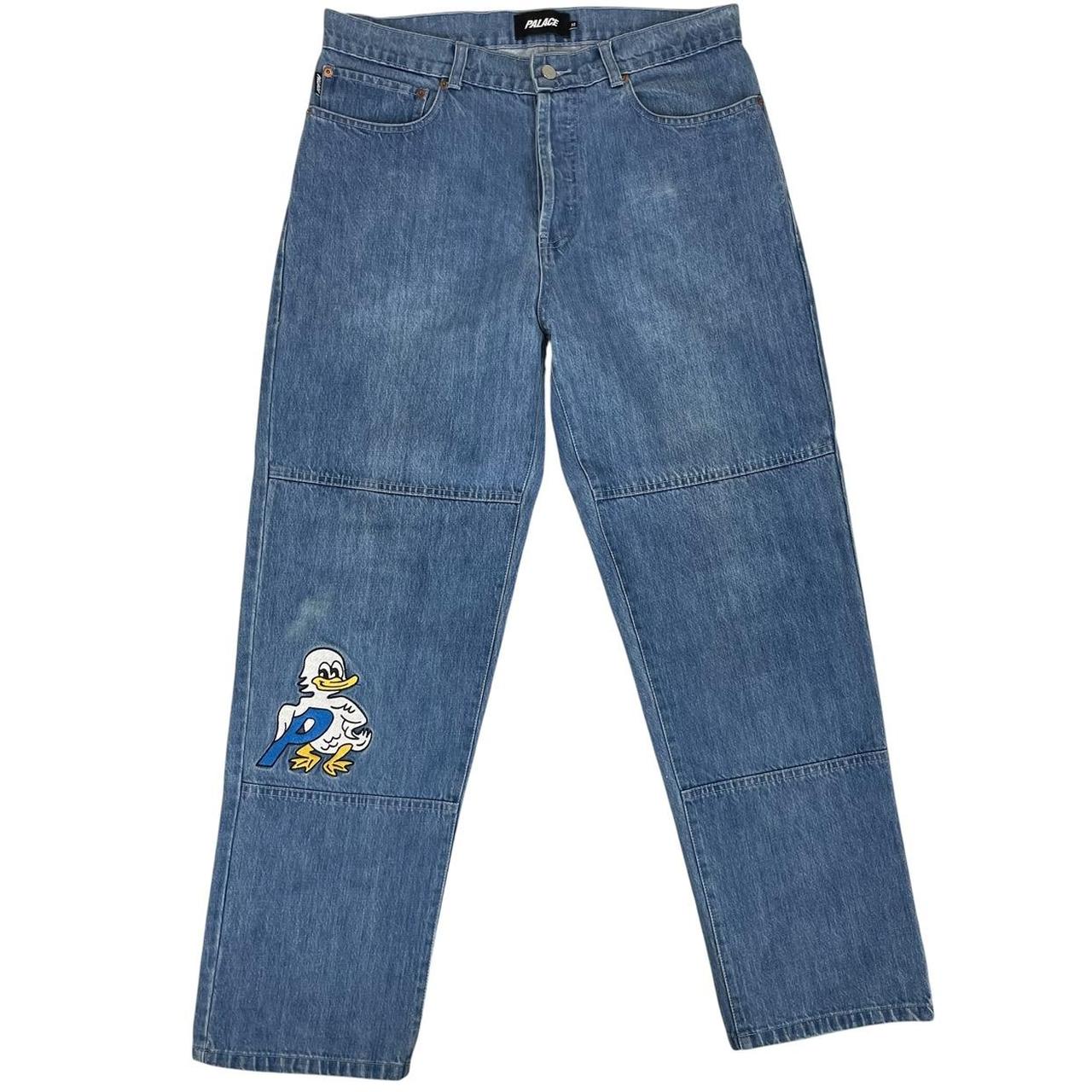 Palace blue straight jeans with mid stone wash and quacked pattern details.