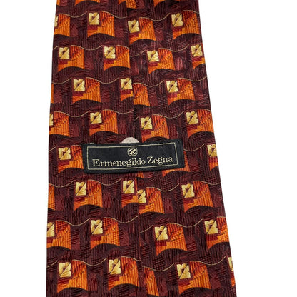 Ermenegildo Zegna brown and orange silk tie with abstract print design.