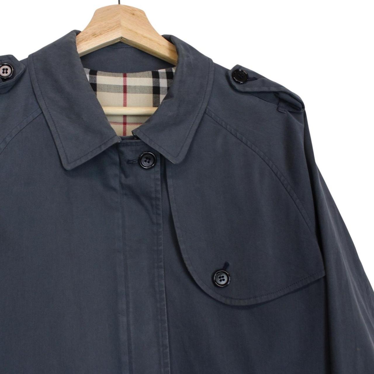 Burberry blue Harrington jacket with Nova Check lining and faint stains on sleeve.