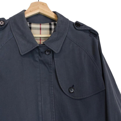 Burberry blue Harrington jacket with Nova Check lining and faint stains on sleeve.