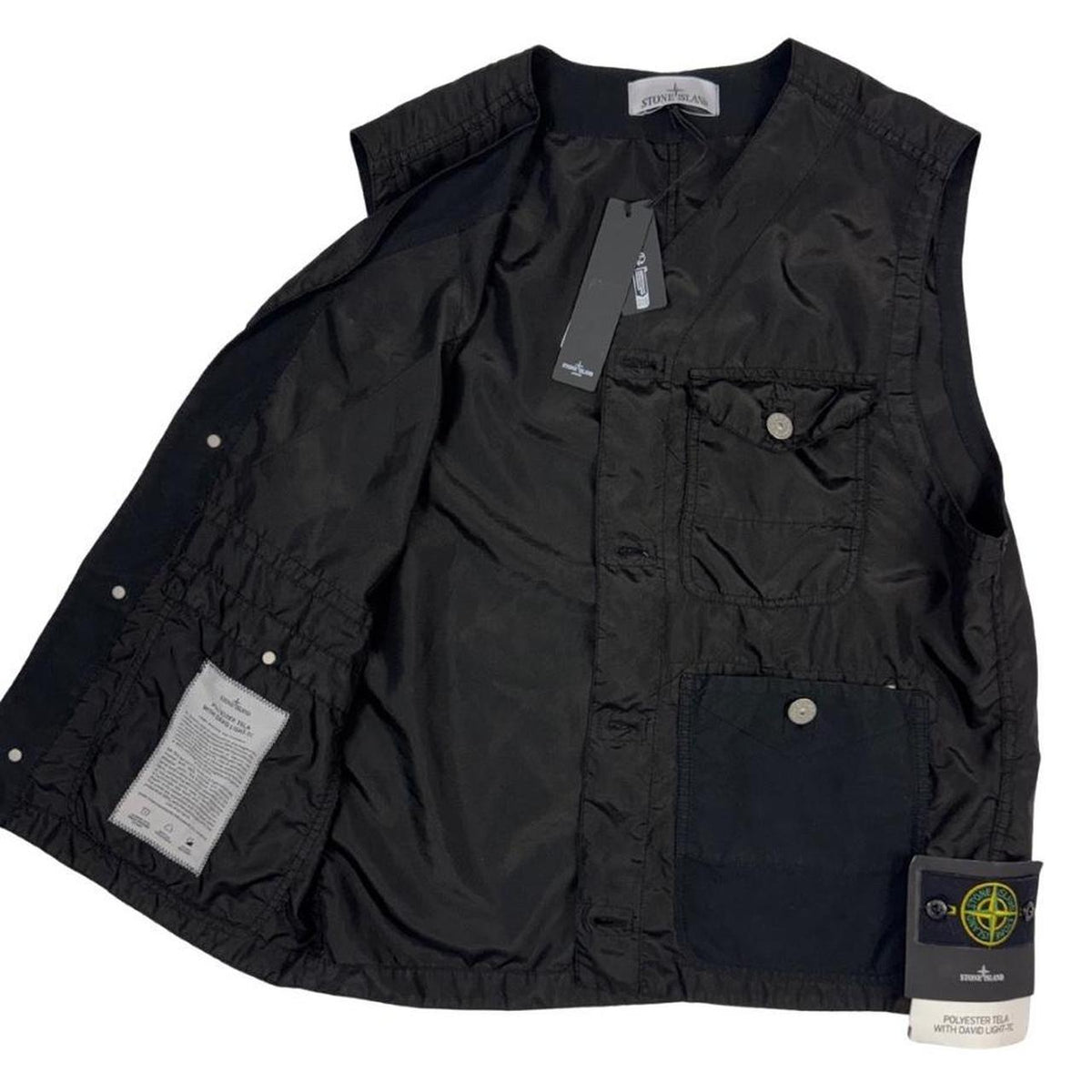 Stone Island black vest jacket, lightweight polyester, logo patch on chest.